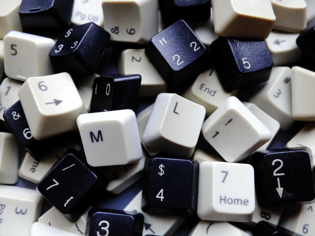 3610649-0-68085600-1738218779-shutterstock_1337978846-1 Black and white computer keyboard keys, mostly numeric with M and L (machine learning) keys in foreground. Concept of unstructured big data for data science and deep learning.