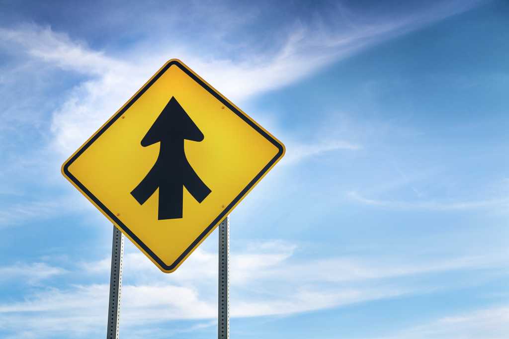 3831631-0-73486600-1740420418-shutterstock_118780819-100963004-orig-1 Merge, merger; road sign with blue-sky background