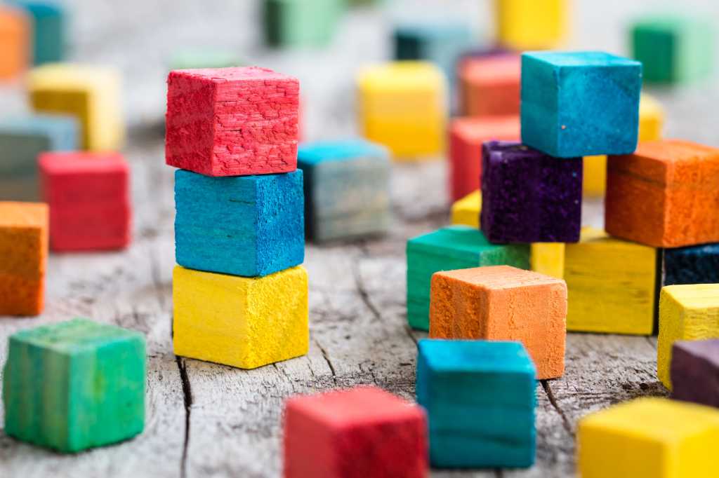 3966149-0-22682700-1745398922-shutterstock_306641441-100963065-orig-1 An assortment of colorful building blocks. Build, assemble, WebAssembly