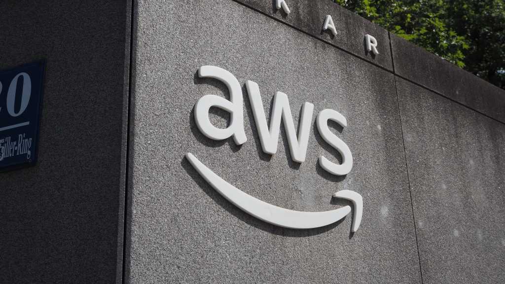 3972093-0-03248700-1745833320-shutterstock_editorial_2329866433-1 AWS logo on wall