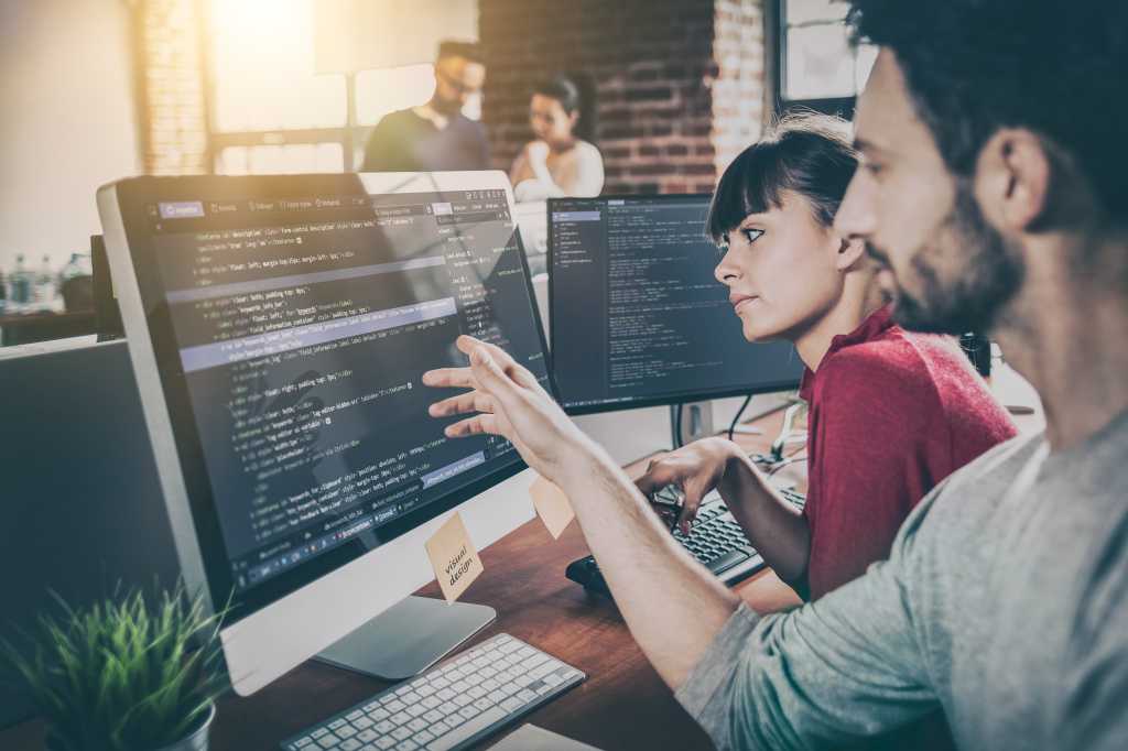 3985747-0-50511200-1747299769-shutterstock_699634498-1 Developing programming and coding technologies. Website design. Programmer working in a software develop company office.