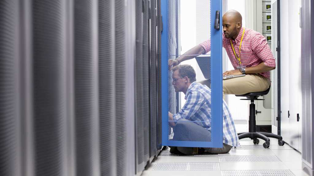 3999740-0-62912200-1748854959-outsourcing-datacenter-shutterstock_1874804530-1 tech workers in data center outsourcing