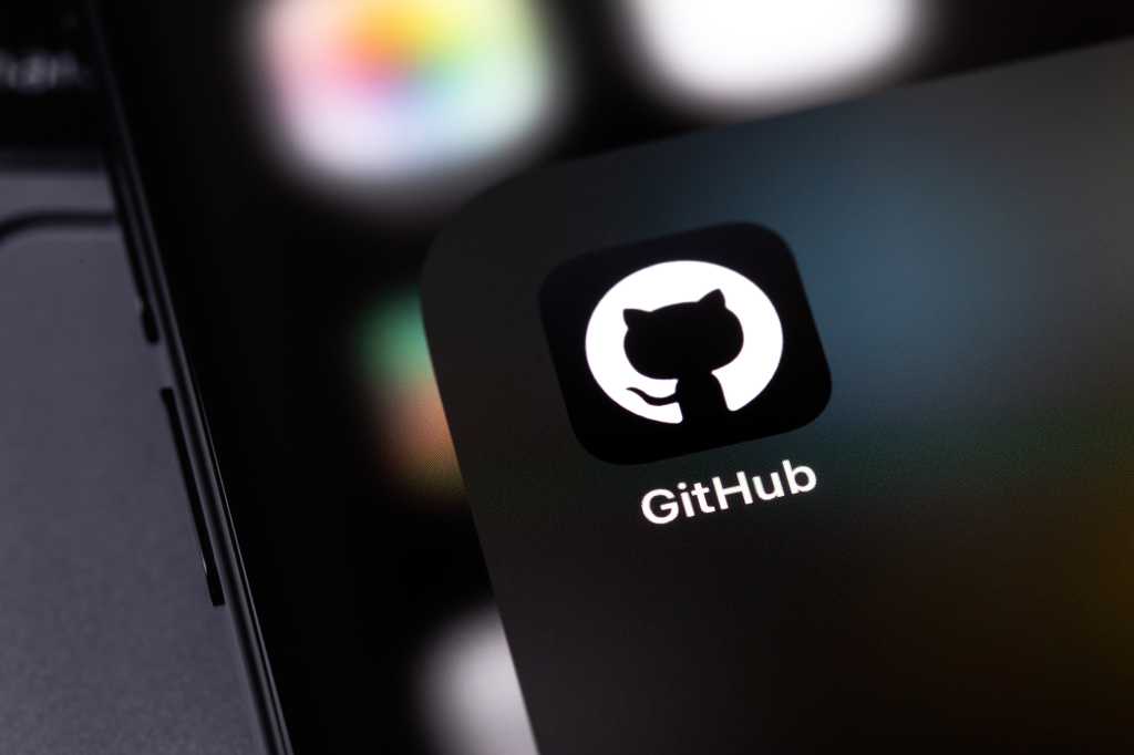 4006787-0-11911500-1749823180-shutterstock_2392299743-1 GitHub mobile icon app on a screen smartphone and notebook closeup. GitHub is the largest web service for hosting and developing IT projects. Batumi, Georgia - November 4, 2023